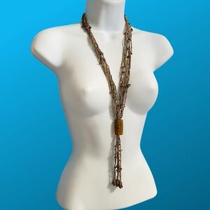 Gold V-Shaped Long Necklace With Boho Tribal Organic Glass Beads Vibe